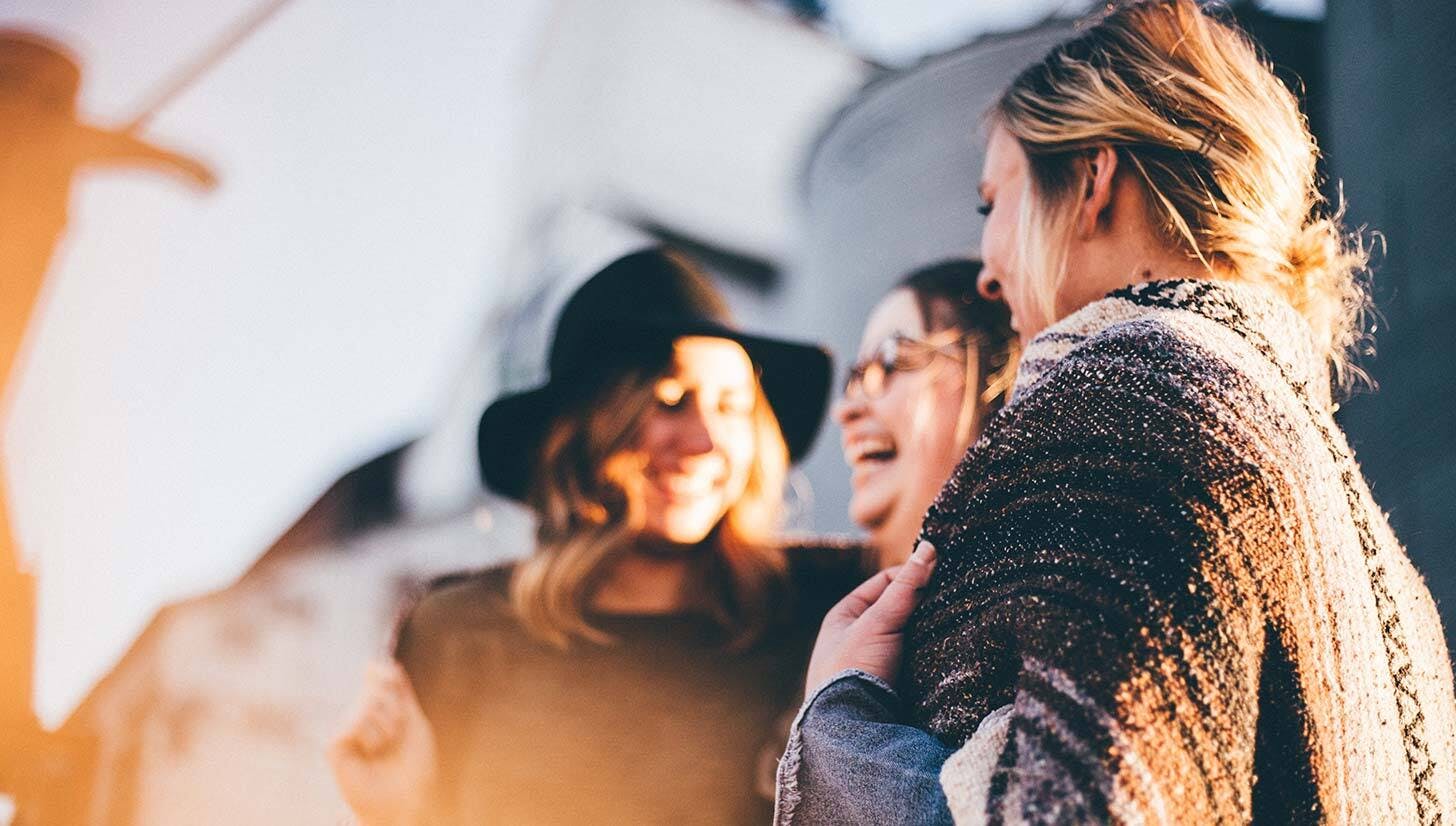 Group of friends outside 1456x826px